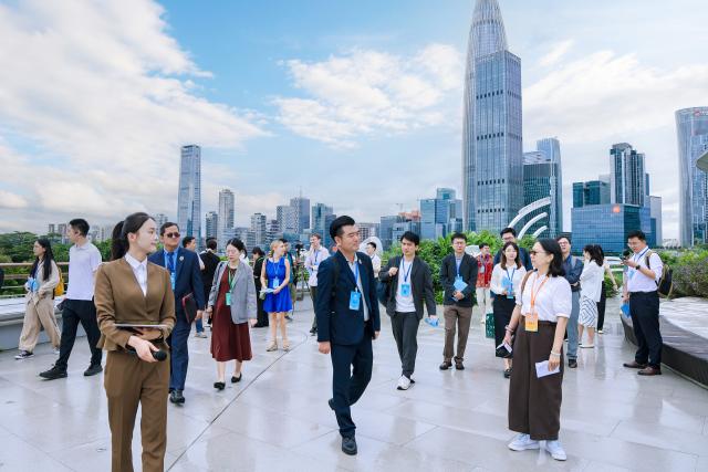 (260823) -- SHENZHEN, Aug. 23, 2026 (Xinhua) -- Guests visit the Chunhui Substation in downtown Shenzhen, south China's Guangdong Province, Aug. 21, 2026.
  TO GO WITH "China's tech city inspires youth discussions on Asia-Pacific's green future" (Xinhua)