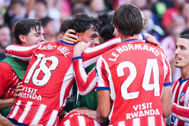 (260824) -- MADRID, Aug. 24, 2026 (Xinhua) -- Atletico de Madrid's players celebrate scoring during the Spanish La Liga football match between Atletico de Madrid and Villarreal at Metropolitano stadium in Madrid, Spain, Aug. 23, 2026. (Photo by Gustavo Valiente/Xinhua)