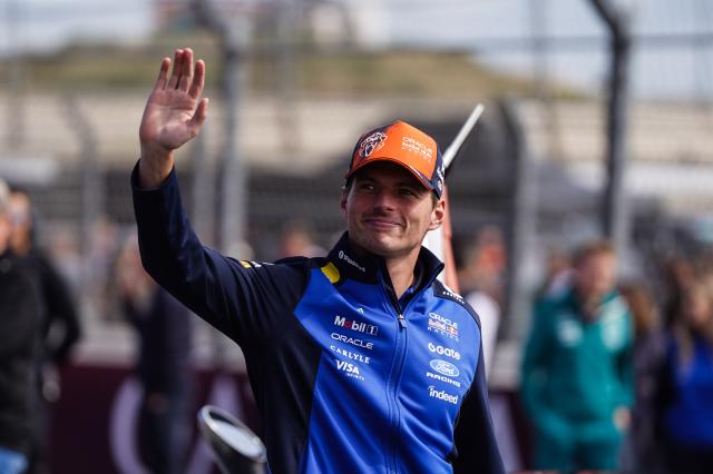 (260824) -- ZANDVOORT, Aug. 24, 2026 (Xinhua) -- Red Bull's Dutch driver Max Verstappen waves to spectators before the Formula 1 Dutch Grand Prix Race at Zandvoort Circuit, near Amsterdam, the Netherlands, Aug. 23, 2026. (Xinhua/Peng Ziyang)
