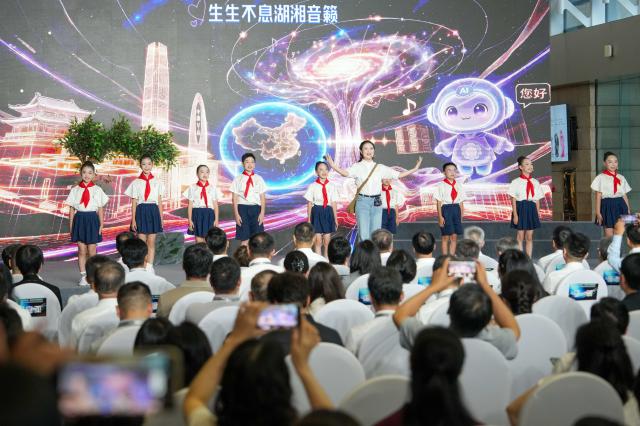 (260824) -- CHANGSHA, Aug. 24, 2026 (Xinhua) -- Children perform at the opening ceremony of the Exhibition Hall of the Project for the Protection of Language Resources of China in Changsha, central China's Hunan Province, Aug. 24, 2026. A new exhibition hall dedicated to the preservation of China's diverse language resources opened on Monday in Changsha, capital of central China's Hunan Province, bringing a decade-long effort to document languages and dialects to the public through digital and interactive displays.
  The Exhibition Hall of the Project for the Protection of Language Resources of China, located in the Hunan Museum, brings together recordings and other language materials collected from more than 1,800 field survey sites across China, covering Chinese dialects, ethnic minority languages and related cultural traditions. (Xinhua/Xue Yuge)