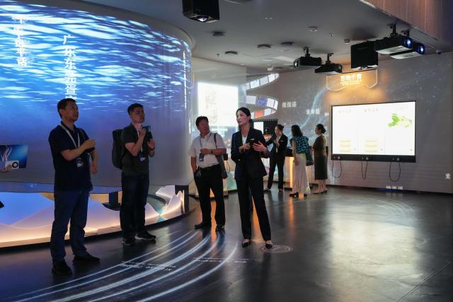 (260824) -- CHANGSHA, Aug. 24, 2026 (Xinhua) -- People visit the Exhibition Hall of the Project for the Protection of Language Resources of China in Changsha, central China's Hunan Province, Aug. 24, 2026. A new exhibition hall dedicated to the preservation of China's diverse language resources opened on Monday in Changsha, capital of central China's Hunan Province, bringing a decade-long effort to document languages and dialects to the public through digital and interactive displays.
  The Exhibition Hall of the Project for the Protection of Language Resources of China, located in the Hunan Museum, brings together recordings and other language materials collected from more than 1,800 field survey sites across China, covering Chinese dialects, ethnic minority languages and related cultural traditions. (Xinhua/Xue Yuge)