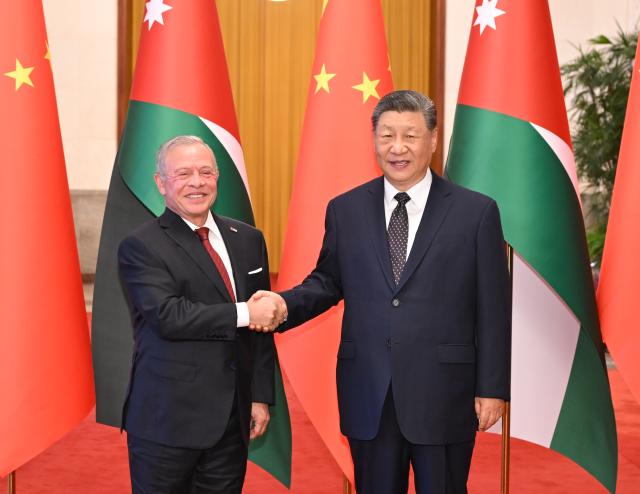 (260824) -- BEIJING, Aug. 24, 2026 (Xinhua) -- Chinese President Xi Jinping holds talks with King of the Hashemite Kingdom of Jordan Abdullah II ibn Al Hussein, who is on a state visit to China, at the Great Hall of the People in Beijing, capital of China, Aug. 24, 2026. (Xinhua/Li Xiang)