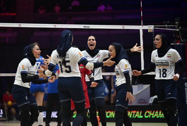 (260824) -- TIANJIN, Aug. 24, 2026 (Xinhua) -- Players of Iran celebrate during the pool A match between China and Iran at AVC Women's Volleyball Continental Championship in Tianjin, China, Aug. 24, 2026. (Xinhua/Zhao Zishuo)
