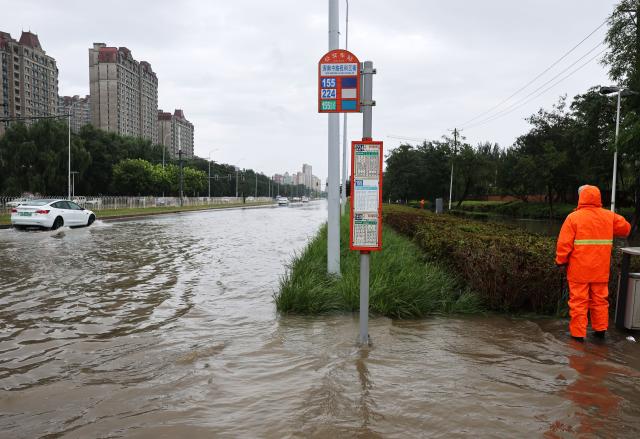 (260824) -- SHENYANG, Aug. 24, 2026 (Xinhua) -- A waterlogged street is seen in Shenyang, northeast China's Liaoning Province, Aug. 24, 2026. Heavy to torrential rains lashed southeastern Liaoning from 8 a.m. Sunday to 11 a.m. Monday, with downpours in some areas, while northern and western parts of the province saw light to moderate rain and localized heavy to torrential rains in a few spots.
Red alerts for torrential rain remain in effect across multiple parts of Liaoning. As of 6 a.m. Monday, nine cities had activated flood emergency responses, according to the provincial flood control and drought relief headquarters. (Xinhua/Li Gang)