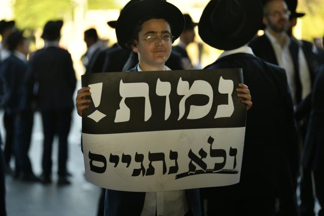 (260824) -- BNEI BRAK, Aug. 24, 2026 (Xinhua) -- Ultra-Orthodox Jews stage a protest against the expansion of military conscription near Bnei Brak, Israel, Aug. 24, 2026. (JINI via Xinhua)