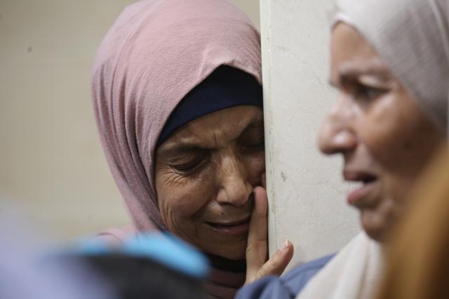 (260825) -- BEIJING, Aug. 25, 2026 (Xinhua) -- Relatives mourn during the funeral of Palestinian child Islam Ahmad Ajjouri, in Askar Al-Jadid refugee camp, east of Nablus, in the West Bank, Aug. 23, 2026. The Palestinian child Islam Ahmad Ajjouri, 14, was killed on Sunday afternoon after succumbing to a critical gunshot wound sustained earlier in the day during an Israeli military raid on Askar Al-Jadid refugee camp. (Photo by Nidal Eshtayeh/Xinhua)