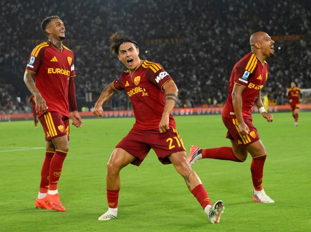 (260825) -- ROME, Aug. 25, 2026 (Xinhua) -- Roma's Donyell Malen (R) and Paulo Dybala (C) celebrate a goal during the Italian Serie A football match between Roma and Fiorentina in Rome, Italy, Aug. 24, 2026. (Photo by Alberto Lingria/Xinhua)