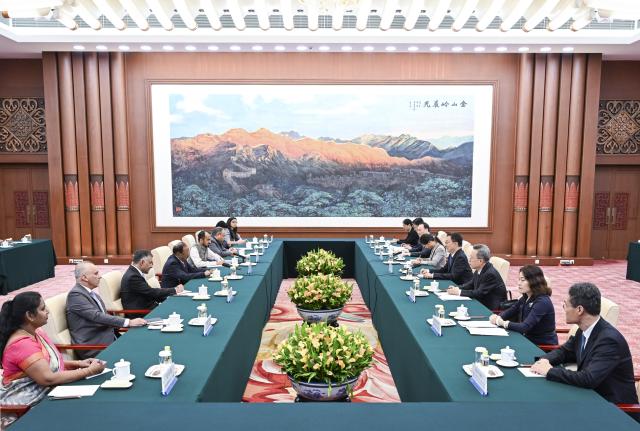 (260825) -- BEIJING, Aug. 25, 2026 (Xinhua) -- Chinese Vice President Han Zheng meets with Ajit Doval, India's National Security Advisor and Special Representative on the China-India boundary question, in Beijing, capital of China, Aug. 25, 2026. (Xinhua/Zhang Ling)