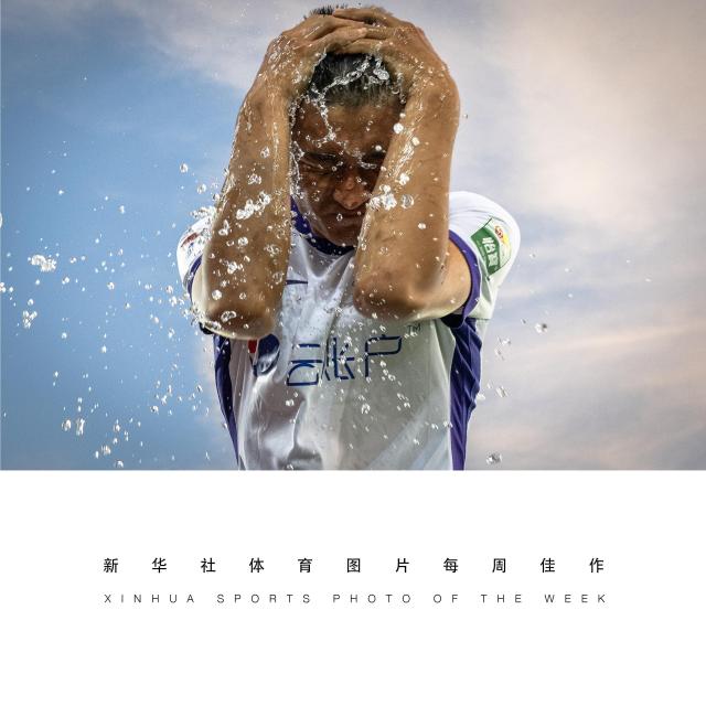 (260825) -- BEIJING, Aug. 25, 2026 (Xinhua) -- XINHUA SPORTS PHOTO OF THE WEEK (from Aug. 17 to Aug. 23, 2026) TRANSMITTED on Aug. 25, 2026. Huang Jiahui of Tianjin Jinmen Tiger reacts before the 24th round match between Tianjin Jinmen Tiger and Wuhan Three Towns FC at the 2026 season Chinese Football Super League (CSL) in Qingdao, China, Aug. 22, 2026. (Xinhua/Xiao Yijiu)
