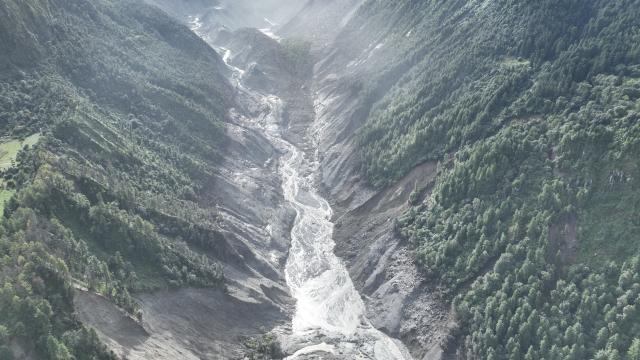 (260827) -- LHASA, Aug. 27, 2026 (Xinhua) -- An aerial drone photo taken on Aug. 27, 2026 shows a mudslide-hit area in Nepal.
  The mudslide caused significant casualties along the China-Nepal border (Xinhua/Jigme Dorje)