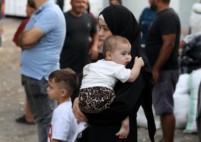 (260827) -- BEIRUT, Aug. 27, 2026 (Xinhua) -- This photo taken on Aug. 27, 2026 in Beirut, Lebanon, shows Syrian displaced persons preparing to return to Syria through the Masnaa border crossing. (Xinhua/Bilal Jawich)