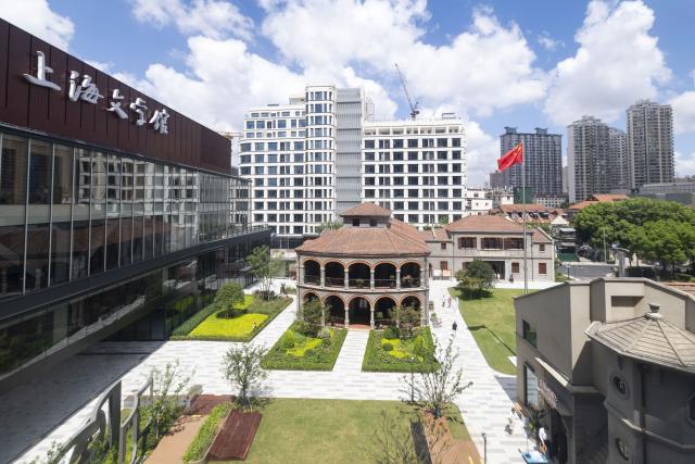 (260827) -- SHANGHAI, Aug. 27, 2026 (Xinhua) -- This photo taken on Aug. 27, 2026 shows a view of the Shanghai Literature Museum in Hongkou District, east China's Shanghai. After years of preparation, the Shanghai Literature Museum, a comprehensive literary institution, officially opened to the public on Thursday, offering a concentrated showcase of the evolution and remarkable achievements of Shanghai literature. 
   The museum consists of a main building and three historic buildings, featuring five permanent exhibition zones that reveal the history and character of Shanghai literature from different perspectives. (Xinhua/Wang Xiang)