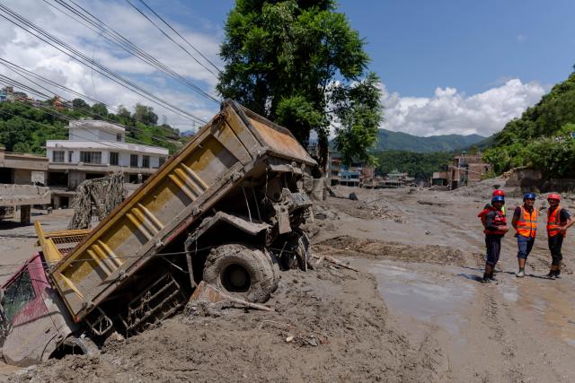 (260827) -- NUWAKOT, Aug. 27, 2026 (Xinhua) -- This photo taken on Aug. 27, 2026 shows a view of a massive flash flood-hit Nuwakot, Nepal. Nepal's National Disaster Risk Reduction Management Authority said that as many as 359 bodies had been recovered from flood-hit areas by Thursday evening, with 910 people still missing. (Photo by Sulav Shrestha/Xinhua)