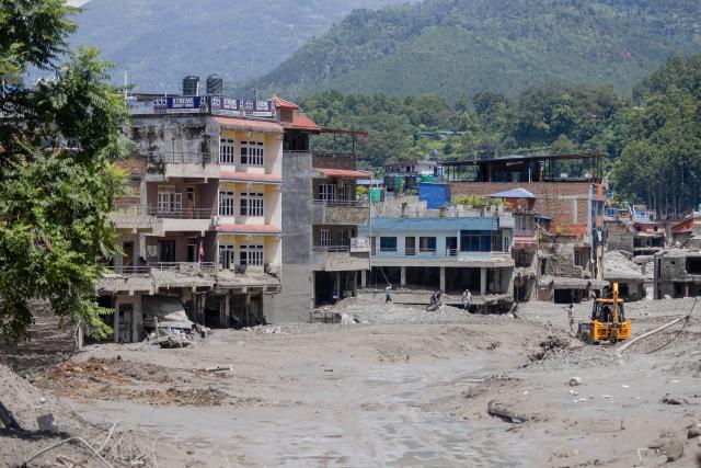 (260827) -- NUWAKOT, Aug. 27, 2026 (Xinhua) -- This photo taken on Aug. 27, 2026 shows a view of a massive flash flood-hit Nuwakot, Nepal. Nepal's National Disaster Risk Reduction Management Authority said that as many as 359 bodies had been recovered from flood-hit areas by Thursday evening, with 910 people still missing. (Photo by Sulav Shrestha/Xinhua)