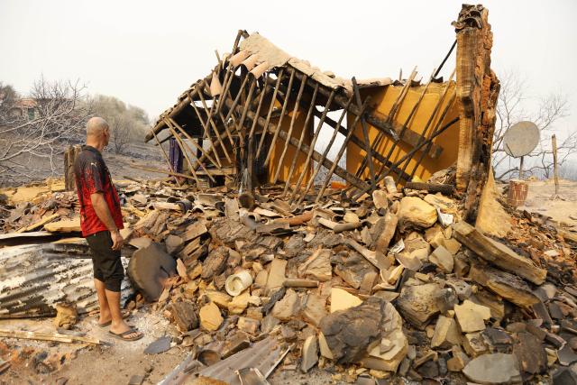 (260827) -- ALGIERS, Aug. 27, 2026 (Xinhua) -- Photo taken on Aug. 27, 2026 shows the aftermath of wildfires in a village in the mountains of Jijel, northeastern Algeria. At least 12 people were killed in wildfires that swept three provinces in northeastern Algeria, Interior Minister Said Sayoud said Wednesday evening. (Photo by Billel Bensalem/Xinhua)