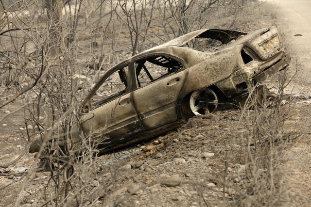 (260827) -- ALGIERS, Aug. 27, 2026 (Xinhua) -- Photo taken on Aug. 27, 2026 shows the aftermath of wildfires in a village in the mountains of Jijel, northeastern Algeria. At least 12 people were killed in wildfires that swept three provinces in northeastern Algeria, Interior Minister Said Sayoud said Wednesday evening. (Photo by Billel Bensalem/Xinhua)