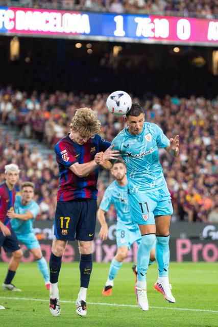 (260828) -- BARCELONA, Aug. 28, 2026 (Xinhua) -- FC Barcelona's Anthony Gordon (front L) vies with Athletic Club's Gorka Guruzeta for a header during the La Liga football match between FC Barcelona and Athletic Club in Barcelona, Spain, on Aug. 27, 2026. (Photo by Joan Gosa/Xinhua)