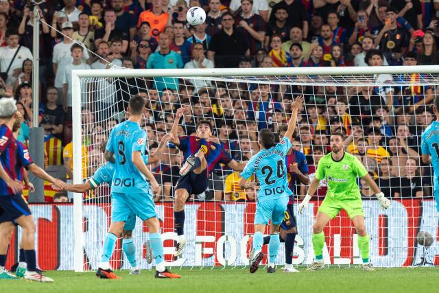 (260828) -- BARCELONA, Aug. 28, 2026 (Xinhua) -- FC Barcelona's Pau Cubarsi (C) shoots during the La Liga football match between FC Barcelona and Athletic Club in Barcelona, Spain, on Aug. 27, 2026. (Photo by Joan Gosa/Xinhua)