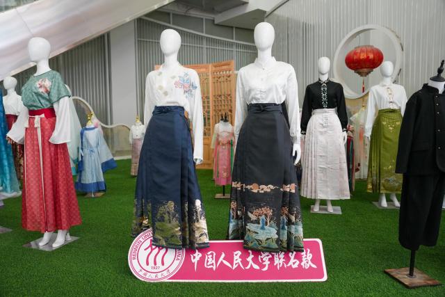 (260828) -- HEZE, Aug. 28, 2026 (Xinhua) -- Hanfu collections are displayed at a digital economy industrial park in Caoxian County of Heze City, east China's Shandong Province, Aug. 27, 2026.
  Caoxian County, a major production hub for original hanfu designs, recorded 13 billion yuan (about 1.9 billion U.S. dollars) in hanfu sales in 2025.
  With a complete industrial chain in place, the county is expanding into doll clothing, ethnic apparel and humanoid robots costumes, showcasing the continued upgrading of its clothing industry. (Xinhua/Dai Mingxuan)