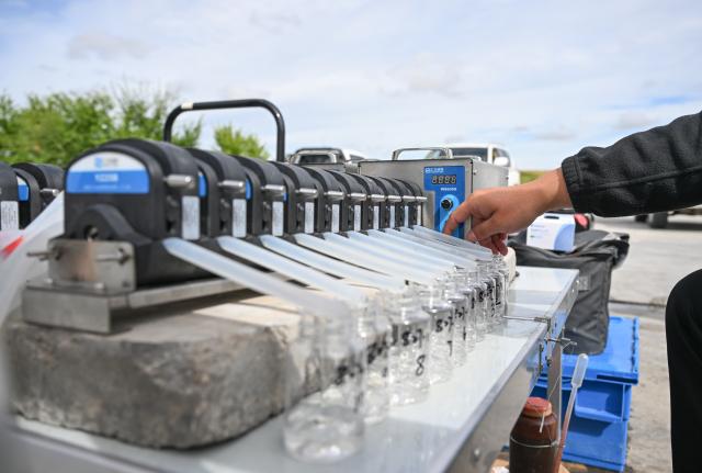 (260828) -- HULUN BUIR, Aug. 28, 2026 (Xinhua) -- A researcher collects water samples from Hulun Lake for algae analysis at Hulun Lake National Nature Reserve in Hulun Buir, north China's Inner Mongolia Autonomous Region, Aug. 27, 2026. Hulun Lake, Ulan Suhai Lake and Daihai Lake are three major freshwater lakes in Inner Mongolia. Once affected by natural and human factors, the lakes suffered from shrinking water areas and deteriorating water quality.
  Comprehensive ecological restoration efforts in recent years have brought notable improvements, with water quality steadily recovering and wildlife species increasing. 
  The three lakes are now playing a stronger role in safeguarding the ecological security of northern China. (Xinhua/Bei He)