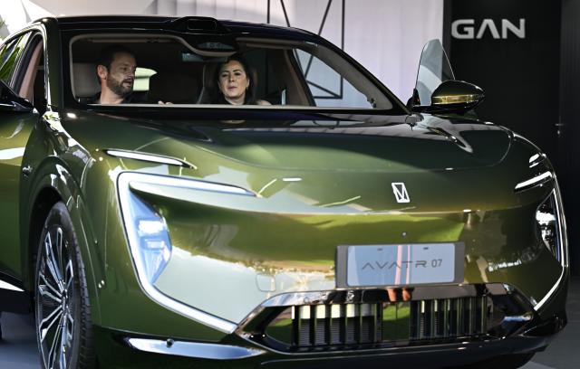 (260828) -- SAO PAULO, Aug. 28, 2026 (Xinhua) -- Visitors sit in a vehicle of Chinese automaker AVATR at the auto edition of the Festival Interlagos 2026 in Sao Paulo, Brazil, Aug. 27, 2026.
  The four-day auto edition of the Festival Interlagos 2026 kicked off on Thursday at the Autodromo Jose Carlos Pace in Sao Paulo. Chinese carmakers showcase their new models of new energy vehicles at the event. (Xinhua/Jin Haoyuan)