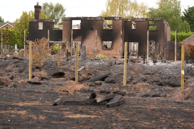 (260828) -- LONDON, Aug. 28, 2026 (Xinhua) -- This photo taken on Aug. 17, 2026 shows the house destroyed by a fire in Stourbridge, Britain. TO GO WITH "Feature: Heat, drought expose Britain's vulnerability to extreme weather" (Xinhua/Zhang Feng)