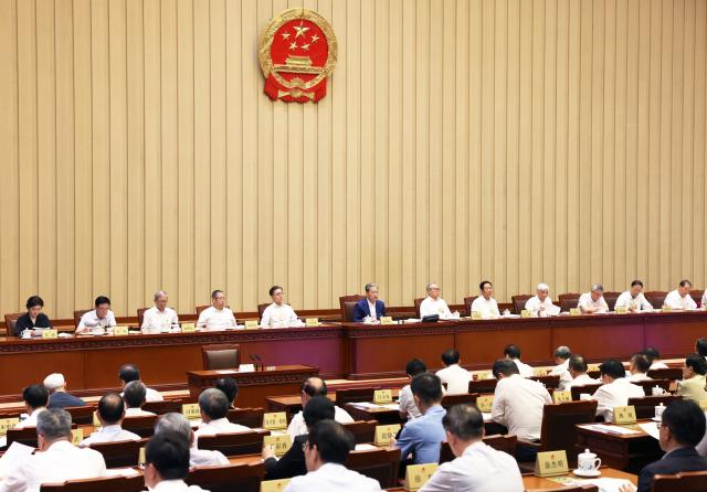 (260828) -- BEIJING, Aug. 28, 2026 (Xinhua) -- Zhao Leji, chairman of the National People's Congress (NPC) Standing Committee, presides over the closing meeting of the 24th session of the 14th NPC Standing Committee at the Great Hall of the People in Beijing, capital of China, Aug. 28, 2026. (Xinhua/Liu Weibing)