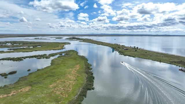 (260829) -- BEIJING, Aug. 29, 2026 (Xinhua) -- An aerial drone photo taken on Aug. 27, 2026 shows staff members patrolling on Hulun Lake in Hulun Buir, north China's Inner Mongolia Autonomous Region. Hulun Lake, Ulan Suhai Lake and Daihai Lake are three major freshwater lakes in Inner Mongolia. (Xinhua/Bei He)