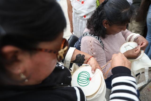 (260829) -- MEXICO CITY, Aug. 29, 2026 (Xinhua) -- Women make nopal-themed embroidery at the Nopal Fair 2026 in Mexico City, capital of Mexico, on Aug. 28, 2026. The event opened here on Friday. The three-day event brings together 140 producers to showcase and sell nopal and processed nopal products, as well as cultural and educational activities. (Photo by Francisco Canedo/Xinhua)