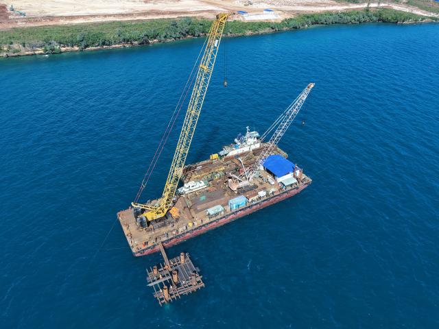 (260829) -- ZANZIBAR, Aug. 29, 2026 (Xinhua) -- An aerial drone photo taken on Aug. 12, 2026 shows a crane vessel for building a static load platform at the construction site of the Zanzibar Mangapwani new port project in Zanzibar, Tanzania.
  TO GO WITH "Feature: Chinese-led port project opens new career paths for Tanzanians" (China Harbor Engineering Company Ltd./Handout via Xinhua)