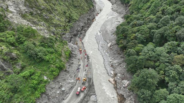 (260829) -- GYIRONG, Aug. 29, 2026 (Xinhua) -- This aerial drone photo shows rescuers repairing a section of national highway G216 leading to the Gyirong Port in Gyirong County, southwest China's Xizang Autonomous Region, on Aug. 29, 2026. (Xinhua/Jigme Dorje)