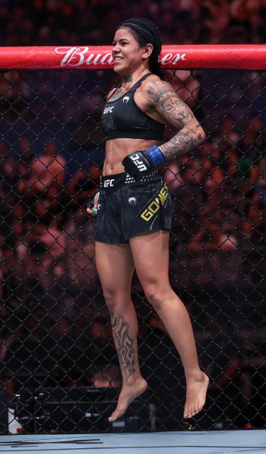 (260829) -- SHANGHAI, Aug. 29, 2026 (Xinhua) -- Denise Gomes of Brazil reacts after defeating Yan Xiaonan of China during the UFC Fight Night Women's Strawweight Bout 3 Rounds at the Oriental Sports Center in east China's Shanghai, Aug. 29, 2026. (Xinhua/Li Ming)