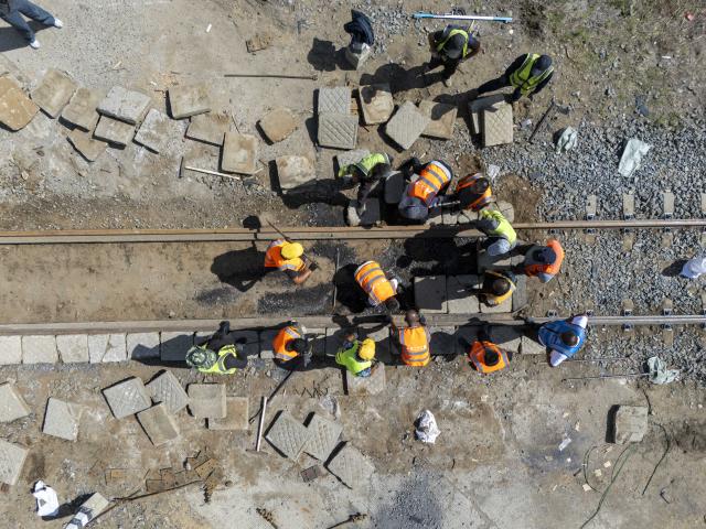 (260829) -- SHUANGYASHAN, Aug. 29, 2026 (Xinhua) -- A drone photo taken on Aug. 29, 2026 shows people working at the site of a rail replacement project on the Youyi-Baoqing Railway, in Youyi County of Shuangyashan, northeast China's Heilongjiang Province. The rail replacement project on the Youyi-Baoqing Railway is scheduled to be completed on Sunday.
   The railway links Youyi County and Baoqing County in northeast China's Heilongjiang Province. Starting operation in 1998, it serves as a dedicated freight corridor for grain and other bulk commodities from the Sanjiang Plain, a leading grain-producing area in China.
   The rail replacement project is a key one of its kind in support of Heilongjiang's plan to further lift its grain production capacity. (Xinhua/Wang Song)