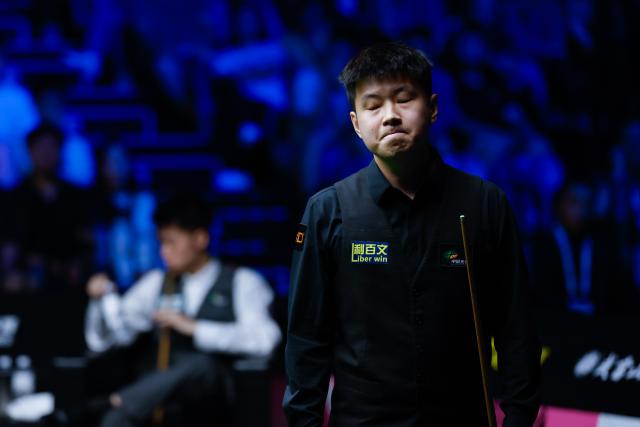 (260829) -- WUHAN, Aug. 29, 2026 (Xinhua) -- Zhao Xintong reacts during the final match between Zhao Xintong of China and Chang Bingyu of China at Wuhan Open 2026 snooker tournament in Wuhan, central China's Hubei Province, Aug. 29, 2026. (Xinhua/Wu Zhizun)