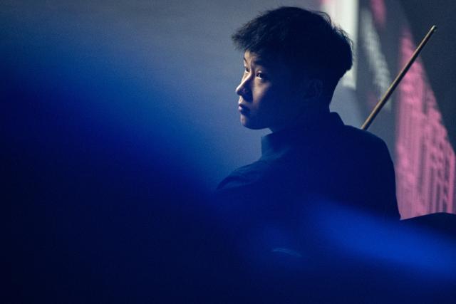 (260829) -- WUHAN, Aug. 29, 2026 (Xinhua) -- Zhao Xintong reacts during the final match between Zhao Xintong of China and Chang Bingyu of China at Wuhan Open 2026 snooker tournament in Wuhan, central China's Hubei Province, Aug. 29, 2026. (Xinhua/Xiao Yijiu)