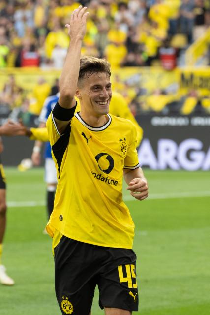 (260830) -- DORTMUND, Aug. 30, 2026 (Xinhua) -- Giannis Konstantelias of Borussia Dortmund celebrates scoring during the German first division Bundesliga football match between Borussia Dortmund and Hamburger SV in Dortmund, Germany, Aug. 29, 2026. (Photo by Joachim Bywaletz/Xinhua)