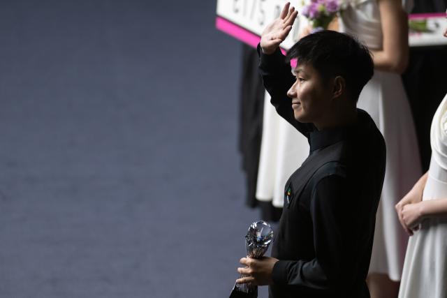 (260830) -- WUHAN, Aug. 30, 2026 (Xinhua) -- Zhao Xintong reacts after the final match between Zhao Xintong of China and Chang Bingyu of China at Wuhan Open 2026 snooker tournament in Wuhan, central China's Hubei Province, Aug. 29, 2026. (Xinhua/Xiao Yijiu)