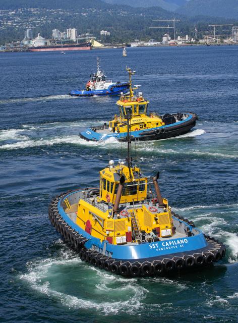 (260830) -- VANCOUVER, Aug. 30, 2026 (Xinhua) -- Tugboats maneuver during a marine demonstration at the Port Day event in Vancouver, British Columbia, Canada, Aug. 29, 2026. The annual event showcased the local maritime industry and its role in moving Canadian trade, featuring marine demonstrations and interactive exhibits that allowed the public to learn about local port operations and safety practices. (Photo by Liang Sen/Xinhua)
