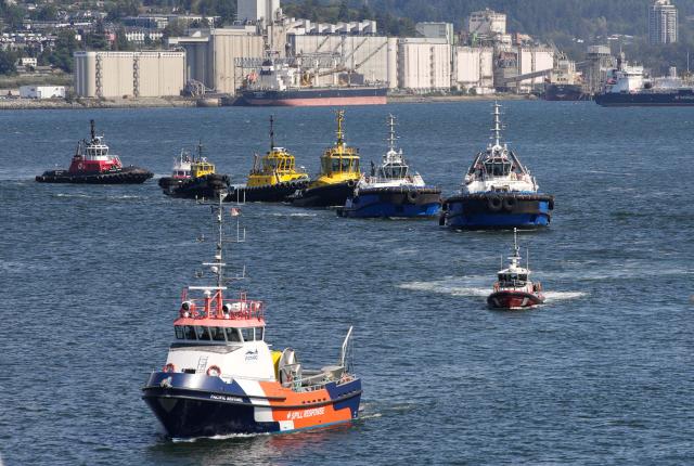 (260830) -- VANCOUVER, Aug. 30, 2026 (Xinhua) -- Boats take part in a marine demonstration during the Port Day event in Vancouver, British Columbia, Canada, Aug. 29, 2026. The annual event showcased the local maritime industry and its role in moving Canadian trade, featuring marine demonstrations and interactive exhibits that allowed the public to learn about local port operations and safety practices. (Photo by Liang Sen/Xinhua)