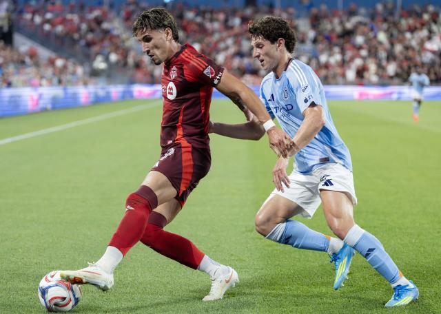 (260830) -- TORONTO, Aug. 30, 2026 (Xinhua) -- Theo Corbeanu (L) of Toronto FC vies with Nico Cavallo of New York City FC during the 2026 Major League Soccer (MLS) regular season match between Toronto FC and New York City FC in Toronto, Canada, on Aug. 29, 2026. (Photo by Zou Zheng/Xinhua)
