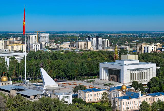 (260830) -- BISHKEK, Aug. 30, 2026 (Xinhua) -- This photo taken on Aug. 25, 2026 shows the Ala-Too Square and a city view of Bishkek, Kyrgyzstan. Bishkek, the capital of Kyrgyzstan and a historic city in Central Asia, offers a blend of history, culture and natural beauty. (Xinhua/Feng Kaihua)