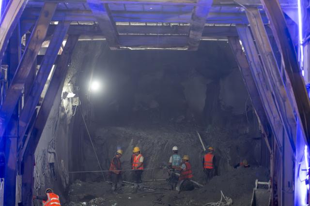 (260830) -- BISHKEK, Aug. 30, 2026 (Xinhua) -- Construction workers are pictured in the Jalalabad tunnel of the China-Kyrgyzstan-Uzbekistan railway in Jalalabad, Kyrgyzstan, Aug. 15, 2026. The China-Kyrgyzstan-Uzbekistan railway is a flagship project of the Belt and Road Initiative, personally promoted by the heads of state of China, Kyrgyzstan and Uzbekistan.
  The route begins in Kashgar, located in northwest China's Xinjiang Uygur Autonomous Region, and passes through the mountainous terrain of Kyrgyzstan to reach Uzbekistan.
  It has become a strategic corridor benefiting all the three countries and their peoples, contributing to regional economic and social development and playing a significant role in promoting infrastructure connectivity, economic and trade exchanges, and high-quality development of the Belt and Road. (Xinhua/Li Renzi)