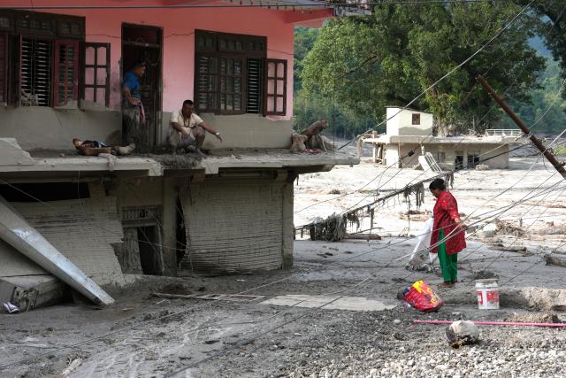 (260830) -- NUWAKOT, Aug. 30, 2026 (Xinhua) -- This photo taken on Aug. 29, 2026 shows a view of the mudslide-affected area in Devighat in Nuwakot, Nepal. As of 9 a.m. local time on Sunday, 734 bodies had been recovered from mudslide-hit areas, with 2,498 people still missing, according to Nepal's National Disaster Risk Reduction and Management Authority. (Xinhua/Liu Tian)