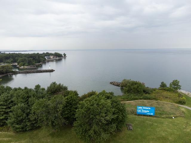 (260830) -- HAMILTON, Aug. 30, 2026 (Xinhua) -- An aerial drone photo taken on Aug. 30, 2026 shows an English-French bilingual sign reading "Lake Ontario Now and Always" at a lakeside conservation area in Hamilton, Ontario, Canada. Canadian Prime Minister Mark Carney said Thursday that the name "Lake Ontario" carries a long history and that Canadians will always use this name regardless of external changes.
  The Canadian prime minister made the remarks after U.S. President Donald Trump signed an executive order earlier on Thursday, directing the Department of the Interior to rename the lake "Lake America," as trade tensions between the United States and Canada have been escalating. (Photo by Zou Zheng/Xinhua)