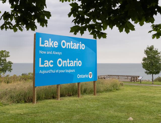 (260830) -- HAMILTON, Aug. 30, 2026 (Xinhua) -- An English-French bilingual sign reading "Lake Ontario Now and Always" is pictured at a lakeside conservation area in Hamilton, Ontario, Canada, on Aug. 30, 2026. Canadian Prime Minister Mark Carney said Thursday that the name "Lake Ontario" carries a long history and that Canadians will always use this name regardless of external changes.
  The Canadian prime minister made the remarks after U.S. President Donald Trump signed an executive order earlier on Thursday, directing the Department of the Interior to rename the lake "Lake America," as trade tensions between the United States and Canada have been escalating. (Photo by Zou Zheng/Xinhua)