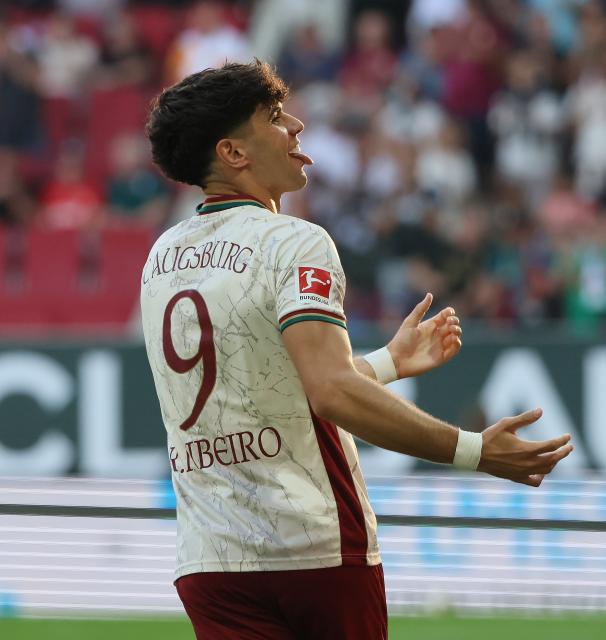 (260831) -- AUGSBURG, Aug. 31, 2026 (Xinhua) -- Rodrigo Ribeiro of FC Augsburg celebrates scoring during the German first division Bundesliga football match between FC Augsburg and FC Schalke 04 in Augsburg, Germany, Aug. 30, 2026. (Photo by Philippe Ruiz/Xinhua)