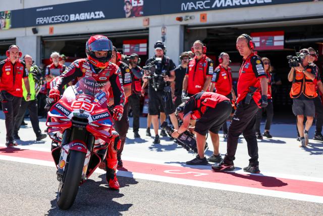 (260831) -- ALCANIZ, Aug. 31, 2026 (Xinhua) -- Ducati Lenovo Team's Marc Marquez (L, front) of Spain reacts before the race of the MotoGP Aragon Grand Prix 2026 at Motorland Aragon Circuit, Alcaniz, Spain, Aug. 30, 2026. (Photo by Qian Jun/Xinhua)