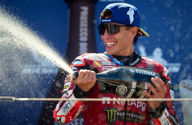(260831) -- ALCANIZ, Aug. 31, 2026 (Xinhua) -- Ducati Lenovo Team's Marc Marquez of Spain reacts on the podium after the race of the MotoGP Aragon Grand Prix 2026 at Motorland Aragon Circuit, Alcaniz, Spain, Aug. 30, 2026. (Xinhua)