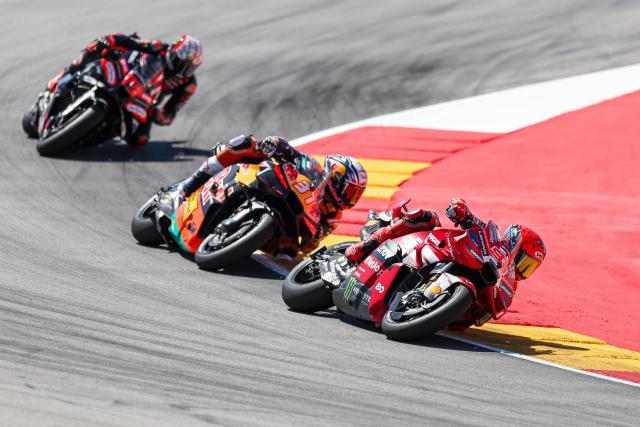 (260831) -- ALCANIZ, Aug. 31, 2026 (Xinhua) -- Ducati Lenovo Team's Marc Marquez (R) of Spain competes during the race of the MotoGP Aragon Grand Prix 2026 at Motorland Aragon Circuit, Alcaniz, Spain, Aug. 30, 2026. (Photo by Qian Jun/Xinhua)