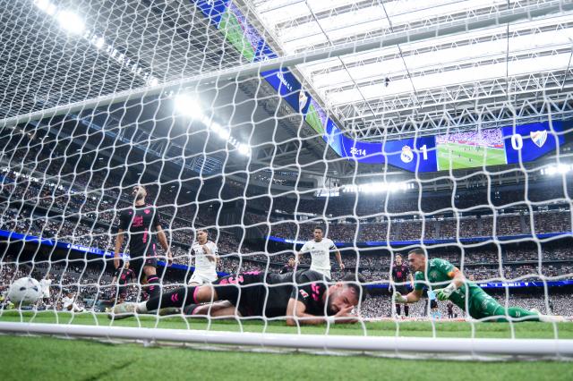 (260831) -- MADRID, Aug. 31, 2026 (Xinhua) -- Real Madrid's Jude Bellingham scores a goal during a La Liga football match between Real Madrid and Malaga CF at Santiago Bernabeu stadium in Madrid, Spain, on Aug. 30, 2026. (Photo by Gustavo Valiente/Xinhua)